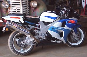 Suzuki TL1000R in front of old truck (17k)